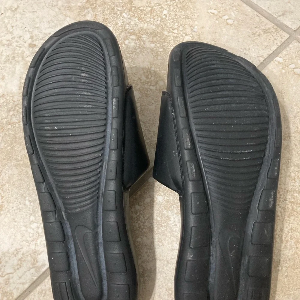 Nike Black Slide Sandals with White Swoosh Detail